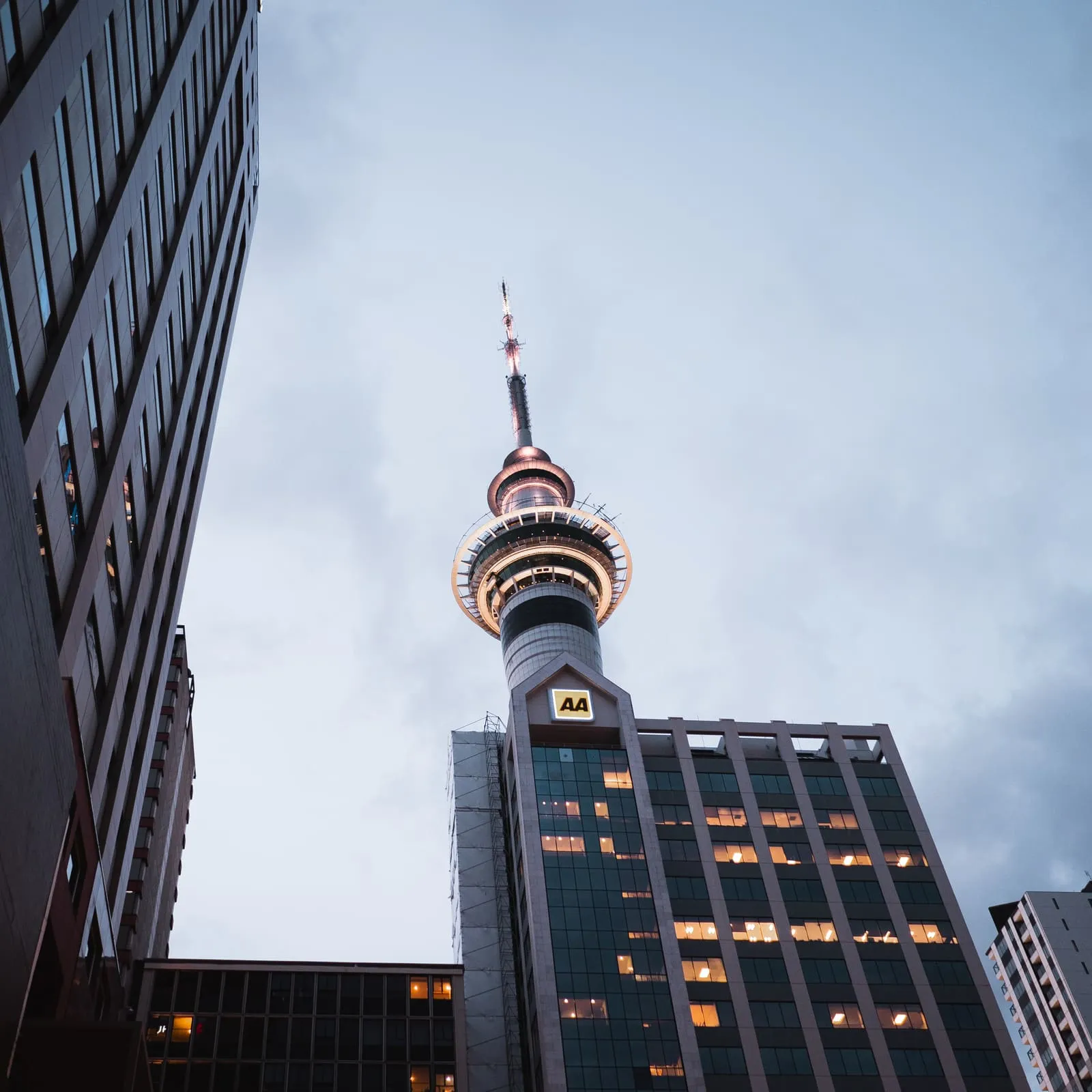 Looking up at the Sky Tower from a central Auckland street